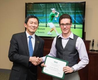 Conor Moran receives the 2016 Peter N. Stearns Provost Scholar Athlete Award from Dr. David Wu.