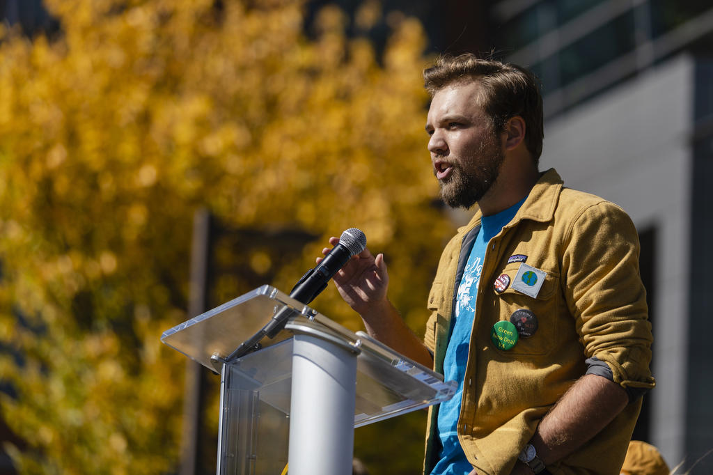Ben Rhoades speaks during the Fridays for Future climate rally at George Mason University.